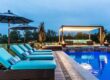 Custom Swimming Pool Builders vs. Production Pool Companies