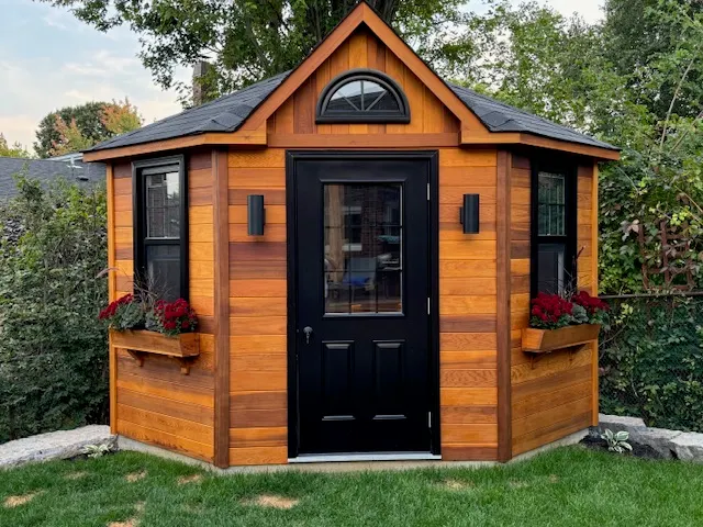 Custom-built backyard shed as part of a Toronto landscape renovation by Land-Con